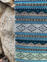 Load image into Gallery viewer, Area rug made by hand, natural dyes create blue, green gray and turquoise accents.