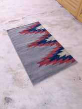 Load image into Gallery viewer, Natural dyes from plants and extracts used to color the handwoven area rug.